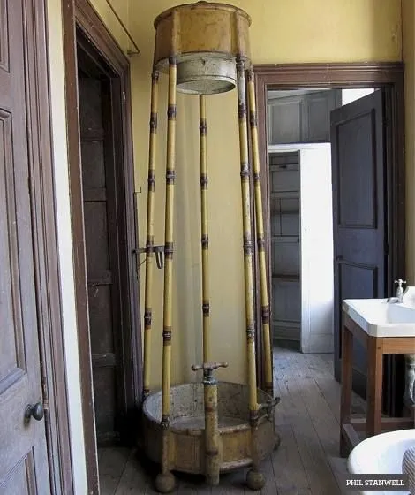 The English Regency Shower around 10 ft tall with metal pipes painted to look like bamboo