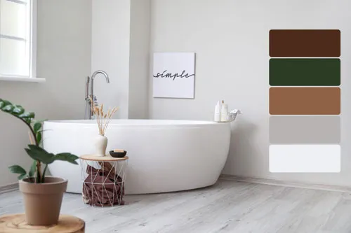 A white bathtub is placed in a corner of a bathroom